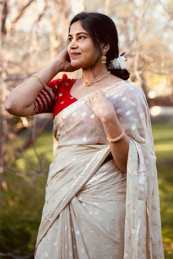 ELEGANT PUJA SPECIAL OFF WHITE VISCOSE SAREE